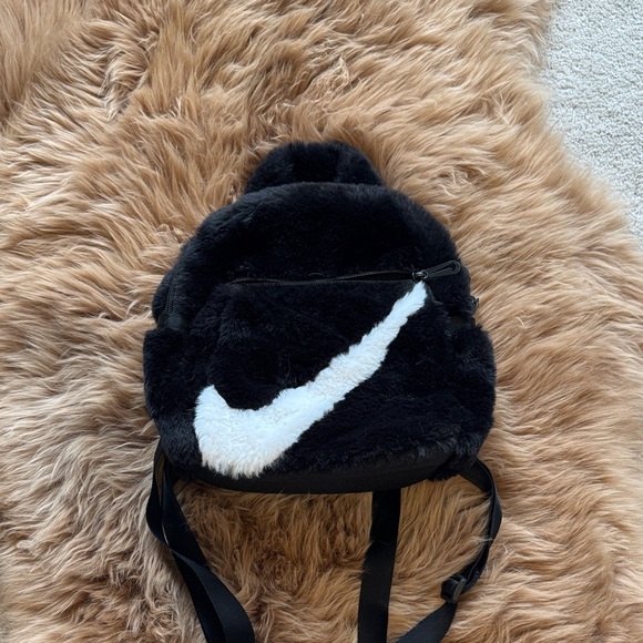 Nike Handbags - Nike Faux-Fur Mini Backpack